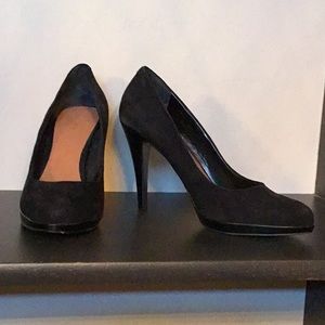 Black suede pumps
